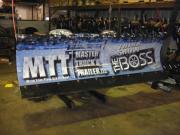 Another snow plow wrapped with General Formulations MotoMark advertising for MTT Master Truck and Trailer