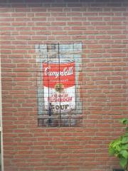 Campbells soup decal on brick wall