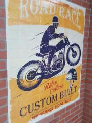 brick wall decal of another motorcycle