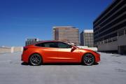 Another profile pic of KPMF Matte Iced Orange on a Tesla car